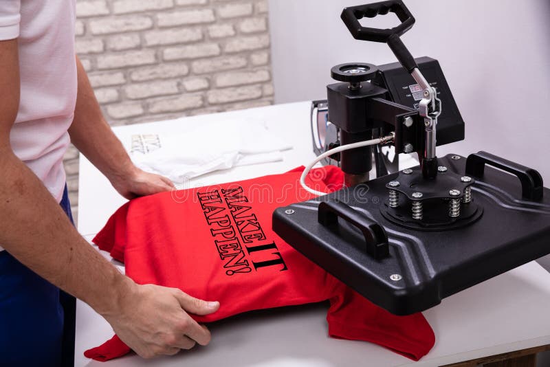 Printing on t shirt in workshop stock images Printing on t shirt in workshop stock images