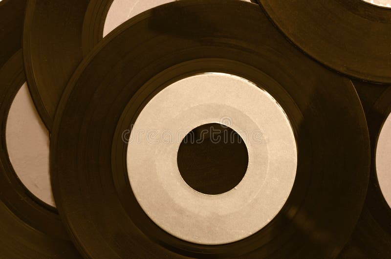 Closeup of 45 rpm vinyl records with blank label. Closeup of 45 rpm vinyl records with blank label