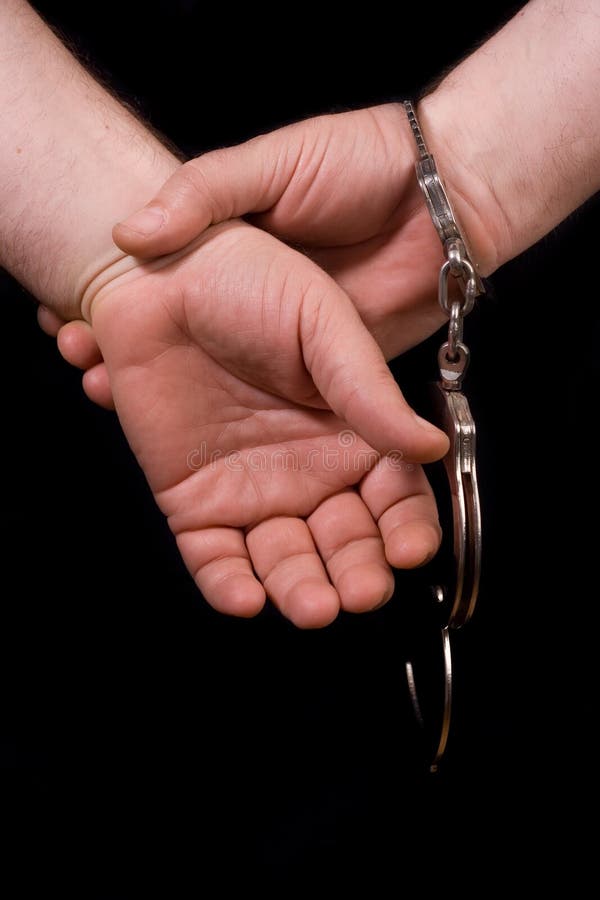 Prisoner hands stock photo