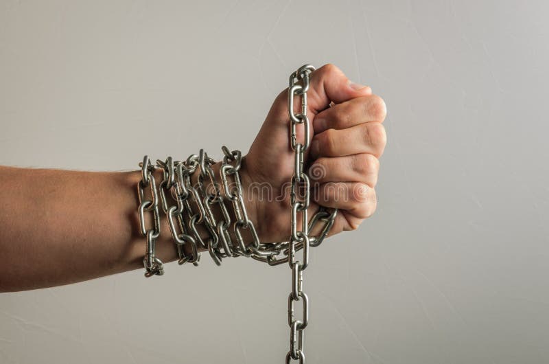 Close-Up Shot of a Woman Bound With Chains · Free Stock Photo