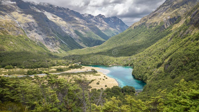 Pristine Alpine Lake Hidden in the Mountain Valley Stock Photo - Image ...