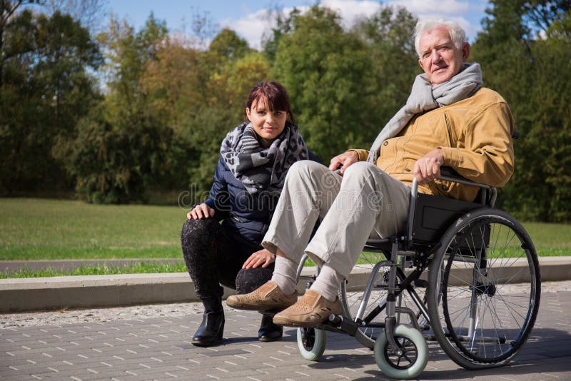 Image of private nurse and her patient with walking problem. Image of private nurse and her patient with walking problem