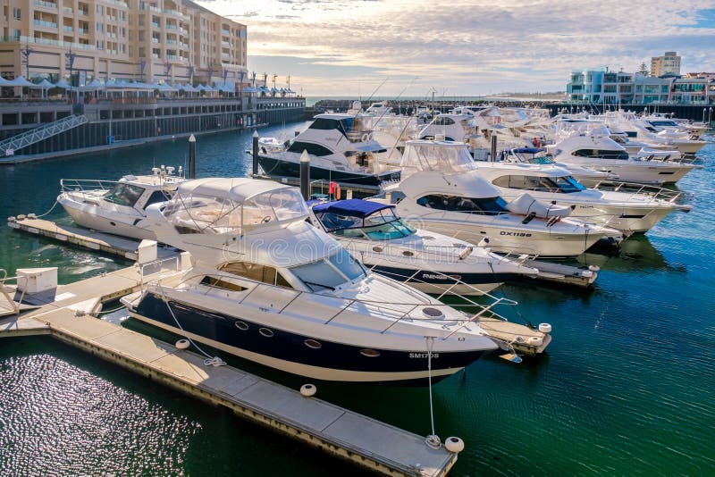 Private boats docked in near Holdfast Promenade Wharf in Glenelg