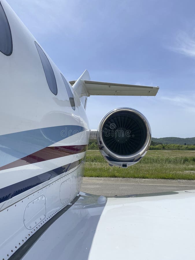 Private jet airplane, view of an engine