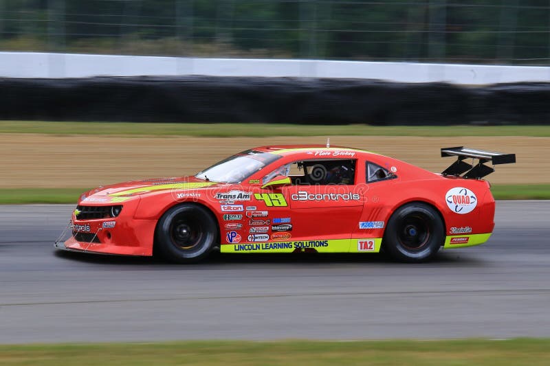 Pro Chevrolet Camaro race car on the course