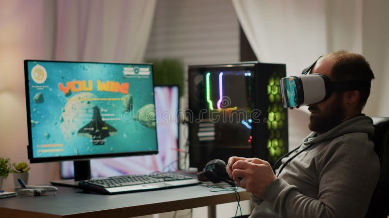 Pro cyber sport gamer relaxing playing video games using vr