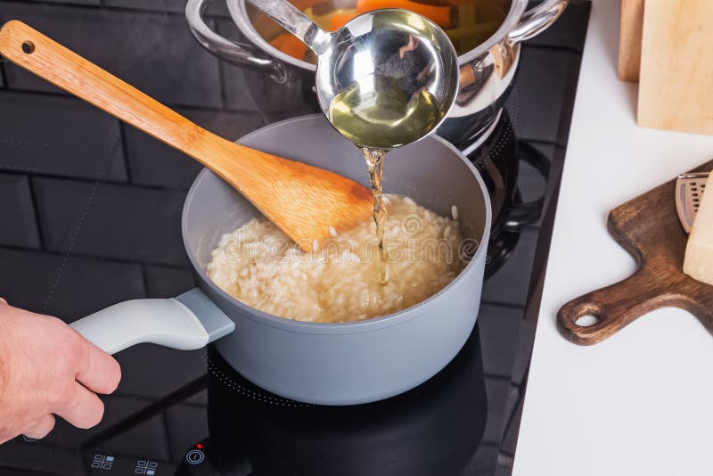 Process of Adding Broth while Cooking Risotto Stock Image Image of