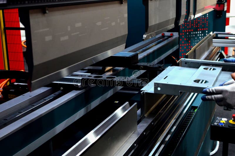 The Process of Bending Sheet Metal on a Sheet Bending Machine Stock