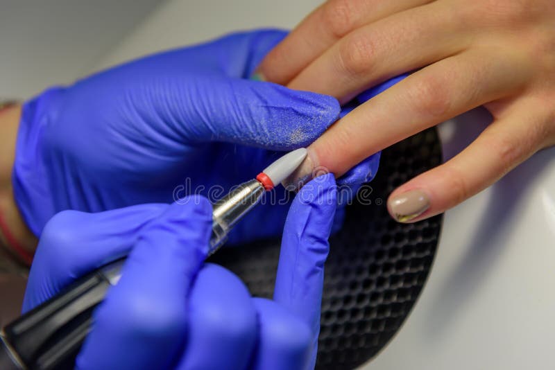 Process of Cleaning the Nail from Old Coating, Preparing before