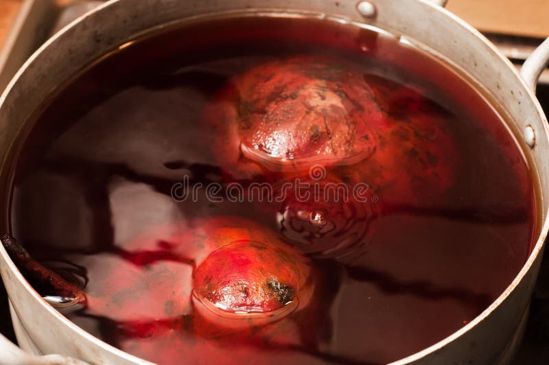 The Process of Cooking Beets in the Pan in the Kitchen Stock Image