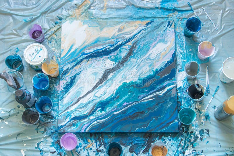 The process of creating a picture of abstraction in the fluid art liquid acrylic stock photos The process of creating a picture of abstraction in the fluid art liquid acrylic stock photos