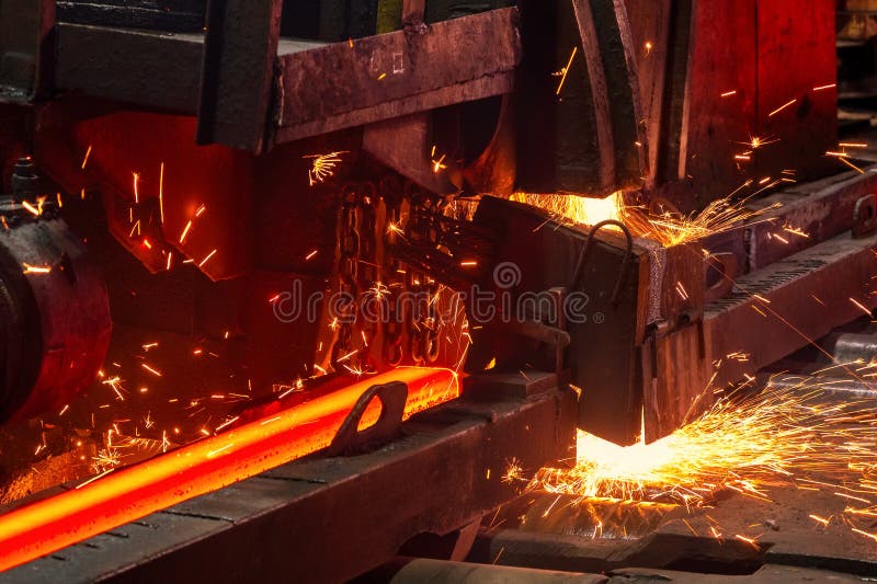 The Process of Cutting Hot Rolled Steel into Lengths Stock Photo
