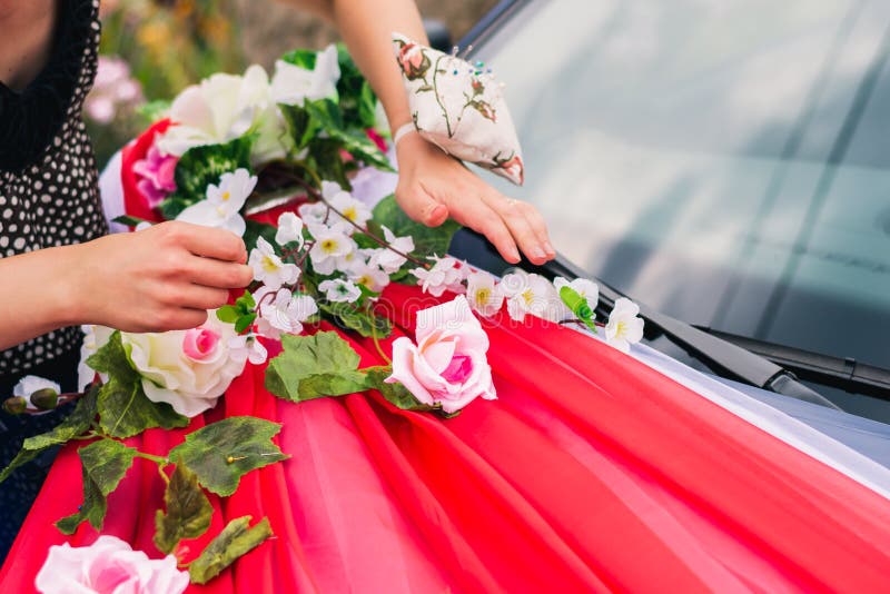 The Process of Decorating a Wedding Car with Artificial Flowers and Drapery Stock Image Image
