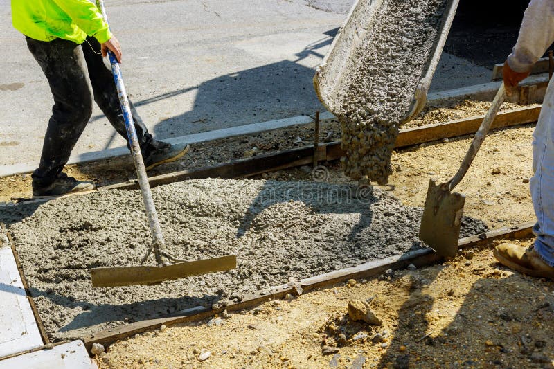 Construction of New Sidewalks Laying Concrete Cement Stock Photo