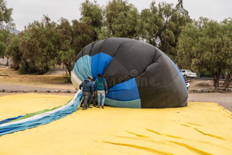 Process of Landing and Folding Hot Air Balloon Editorial Image Image of landing, people 140325745