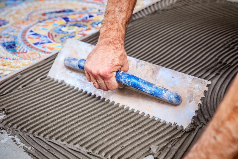 Laying floor ceramic tile stock image. Image of decorate 115573207