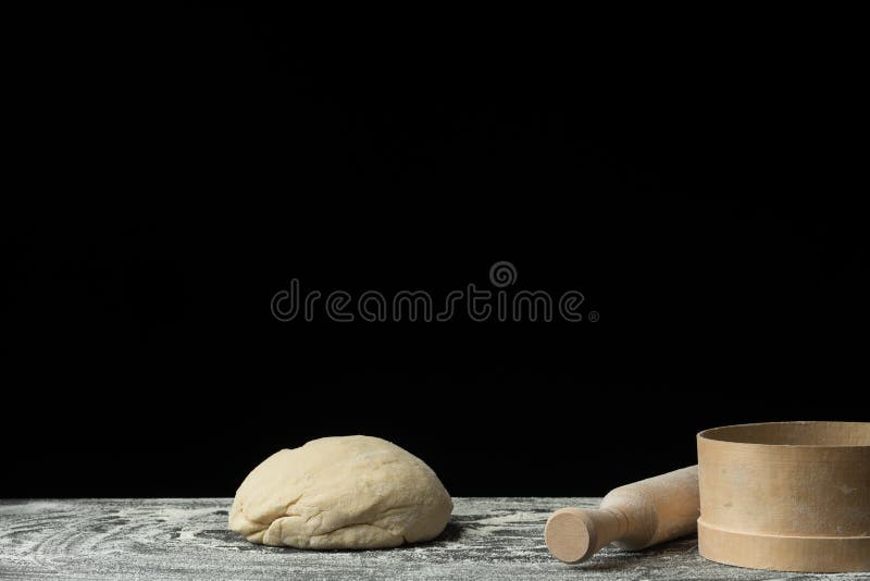 The process of making bread, pasta, sweets or Italian pizza on the village table. Pizza dough stock images The process of making bread, pasta, sweets or Italian pizza on the village table. Pizza dough stock images
