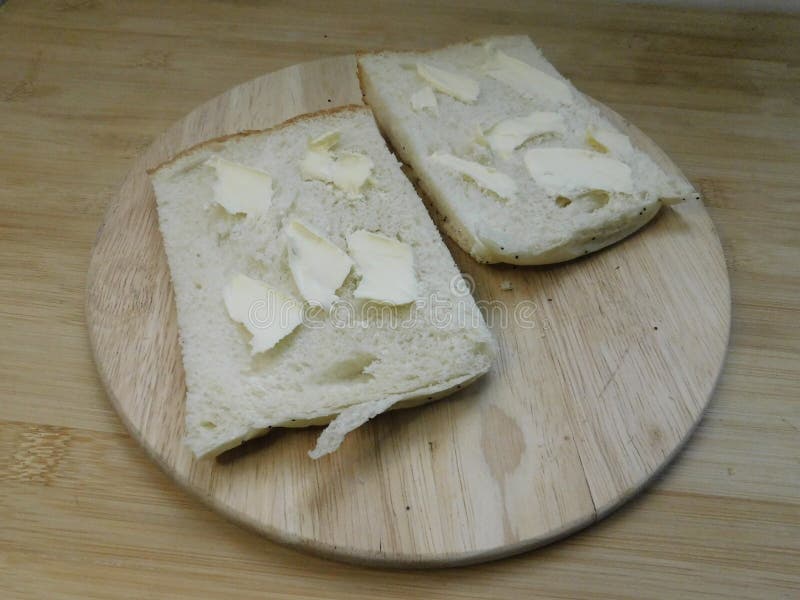 The Process of Making a Sandwich with Ham, Cheese and Egg Stock Photo