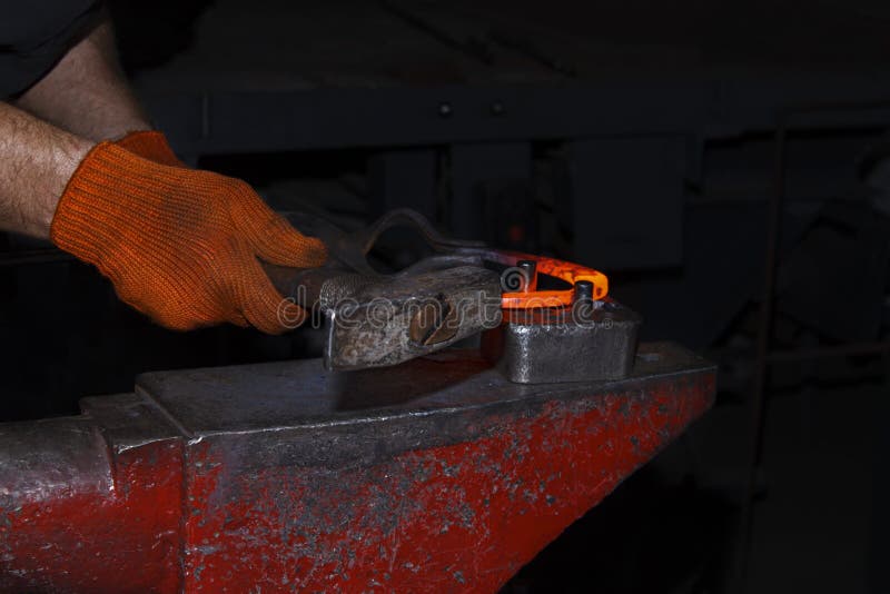 The Process of Manufacturing of Horseshoes for Horses in Stock
