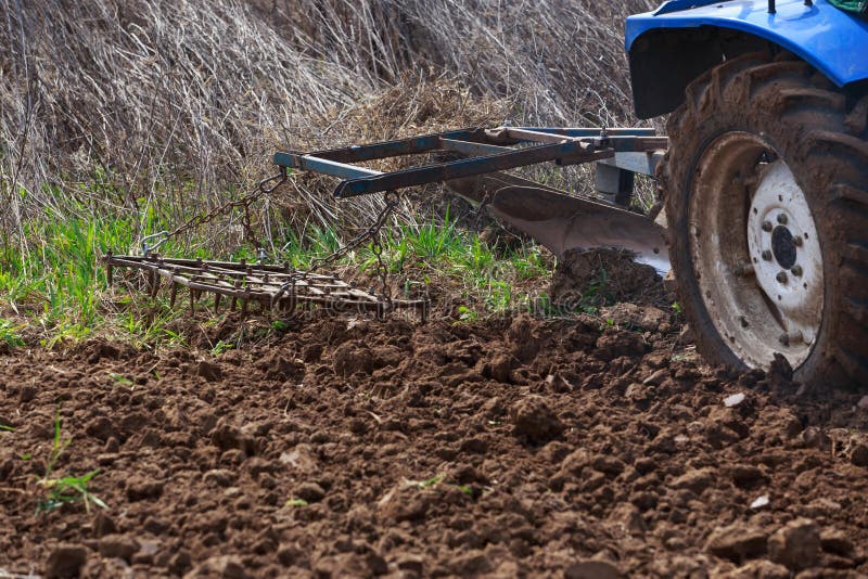 Process of plowing land stock photo. Image of plowing 189025316