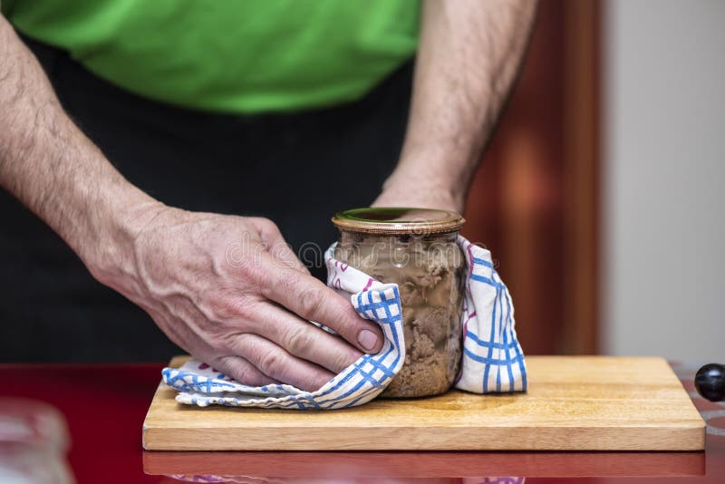 Process of Preparation Homemade Pork Stew. Canned Pork Meat in Jar