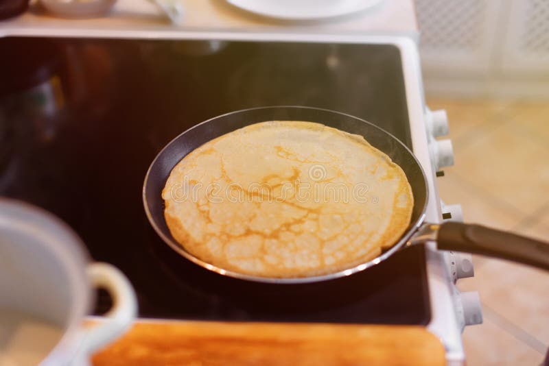 Many Pancakes on a Plate. on the Kitchen Table. Maslenitsa. Top View