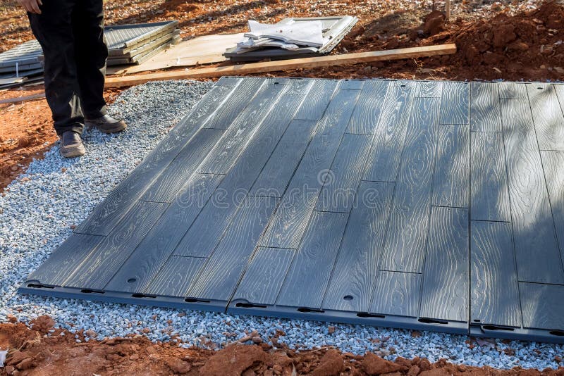 The Process of Putting a Plastic Shed Together for the Back Yard in Our