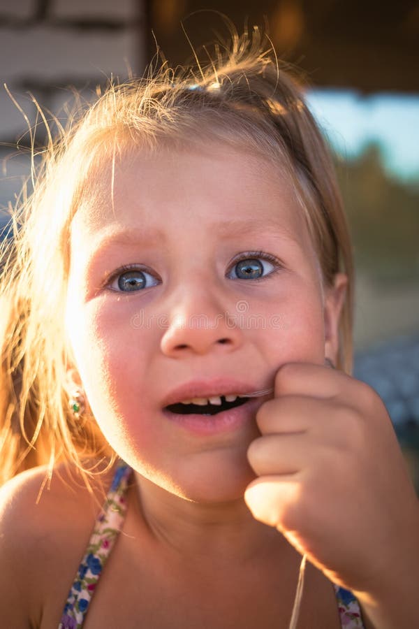 The Process of Removing a Baby Tooth Using a Thread Stock Image Image