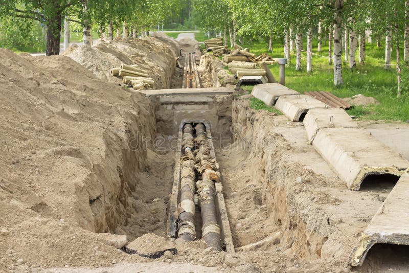 Repair of the Heating Main. the Underground Pipe through Which Steam