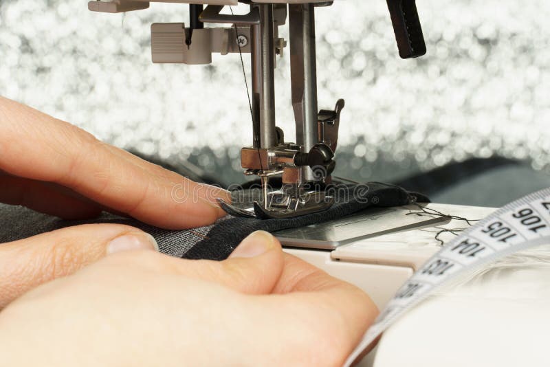 Process of Shortening Jeans Pants on a Sewing Machine Stock Image