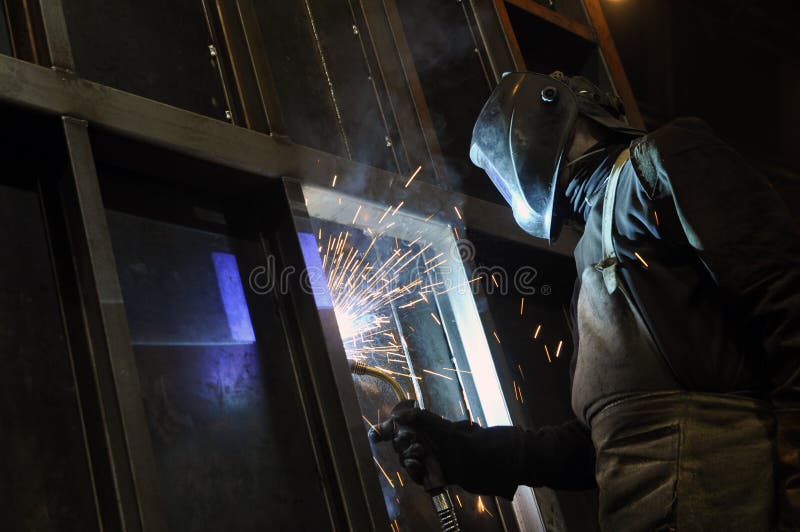 The Process of Welding a Vertical Joint in a Product Stock Image Image of mask, metalwork