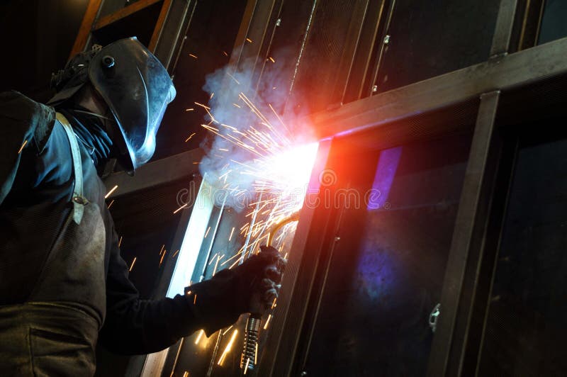 The Process of Welding a Vertical Joint in a Product Stock Photo Image of protection, vertical