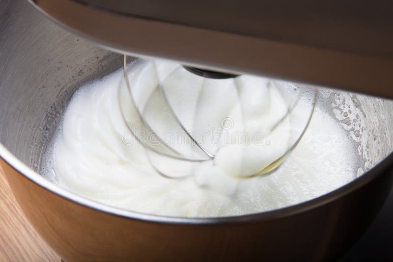 The Process of Whipping Egg Whites in a Mixer. Selective