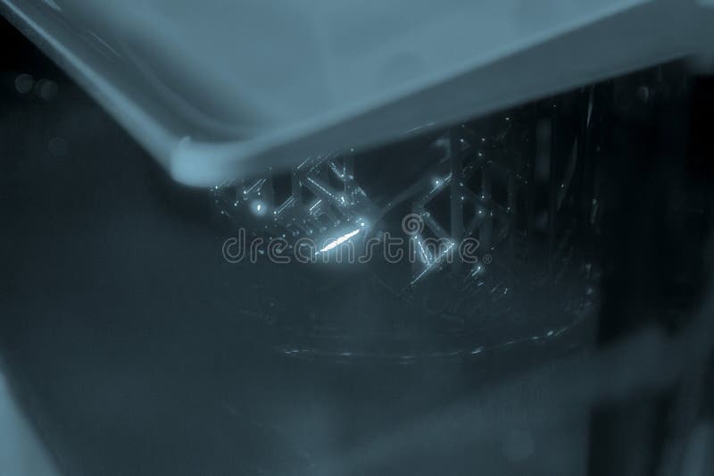 Process working 3D printer close-up. 3D printing from liquid material close-up. stock image