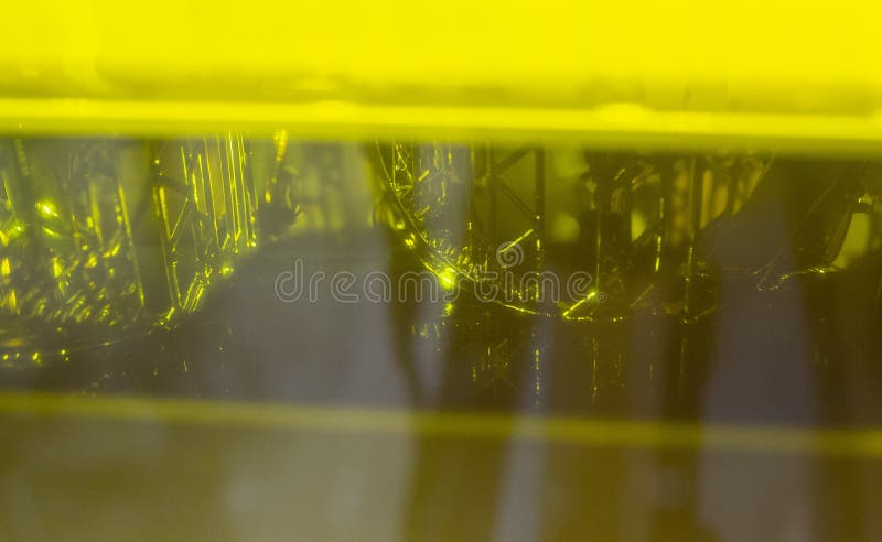 Process working 3D printer close-up. 3D printing from liquid material close-up. stock photography