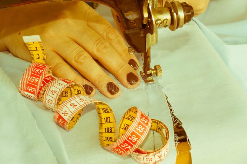 Processes of Sewing on the Sewing Machine Sew Women`s Hands Sewi Stock
