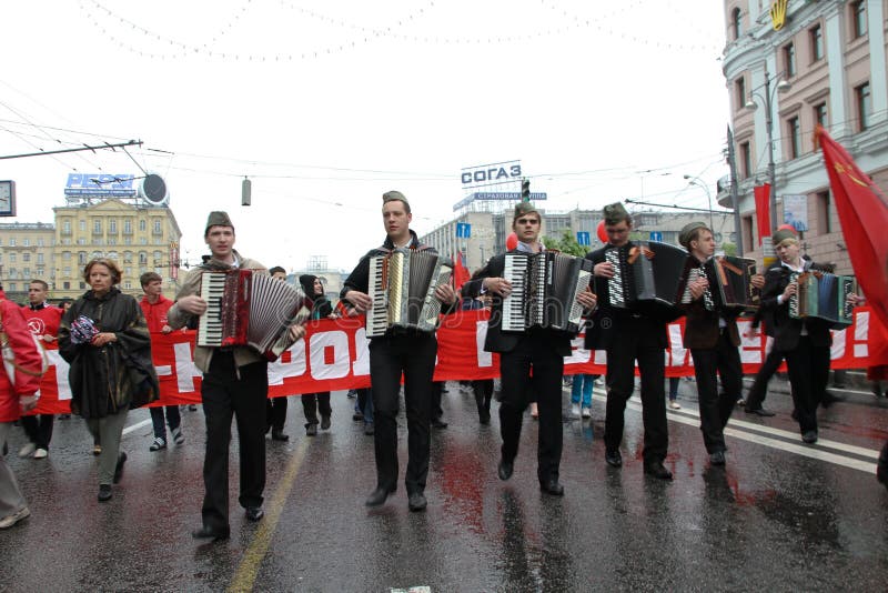 Procession of communists in Moscow. Moscow, Russia - May 9, 2012. March of communists on the Victory Day stock photo Procession of communists in Moscow. Moscow, Russia - May 9, 2012. March of communists on the Victory Day stock photo