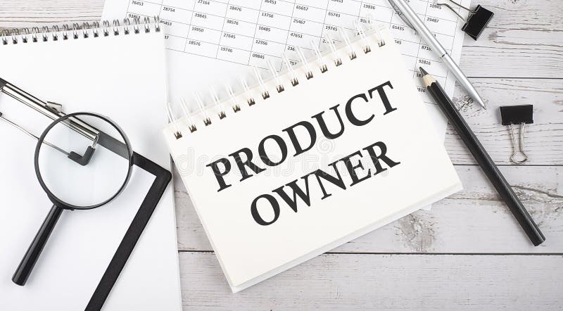 PRODUCT OWNER . Text written on notepad with office tools and documents