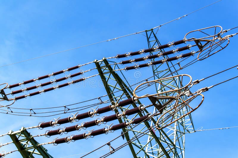 Production of electricity. Energy concept. Detail of high-voltage ceramic insulator. High Voltage Lead.