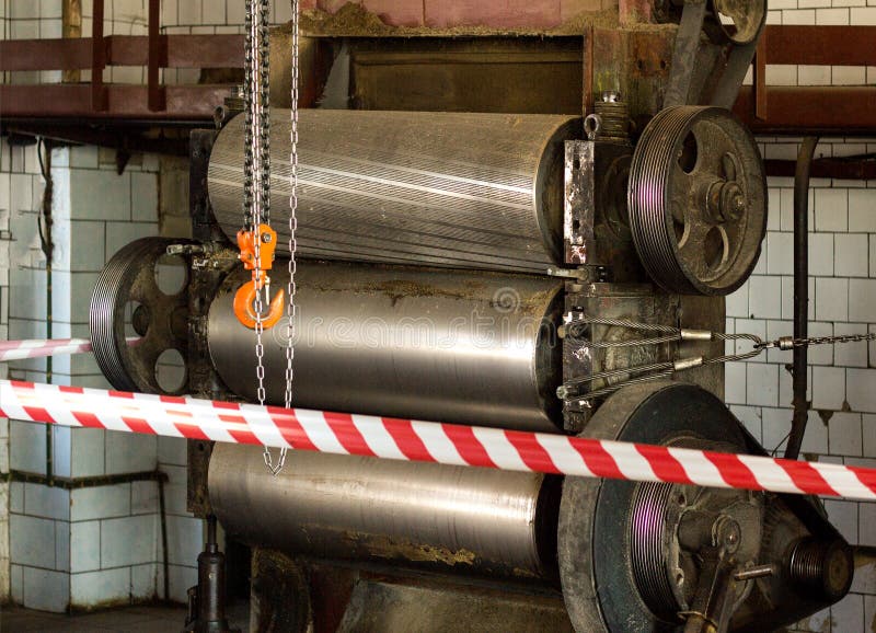 Production equipment rollers are fenced with protective tape, an investigation is underway, an incident, an industrial accident, stock image Production equipment rollers are fenced with protective tape, an investigation is underway, an incident, an industrial accident, stock image