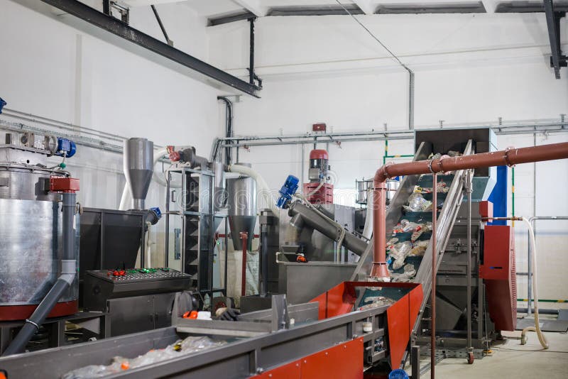 Production line for the processing of plastic waste in the factory stock photography