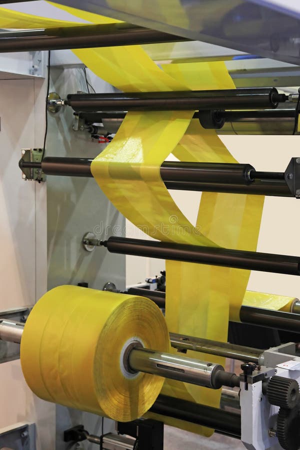 Production of plastic bags stock photo. Image of process 138966940