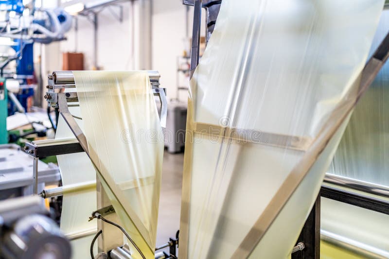 Production of Plastic Packaging Materials in the Factory Stock Image