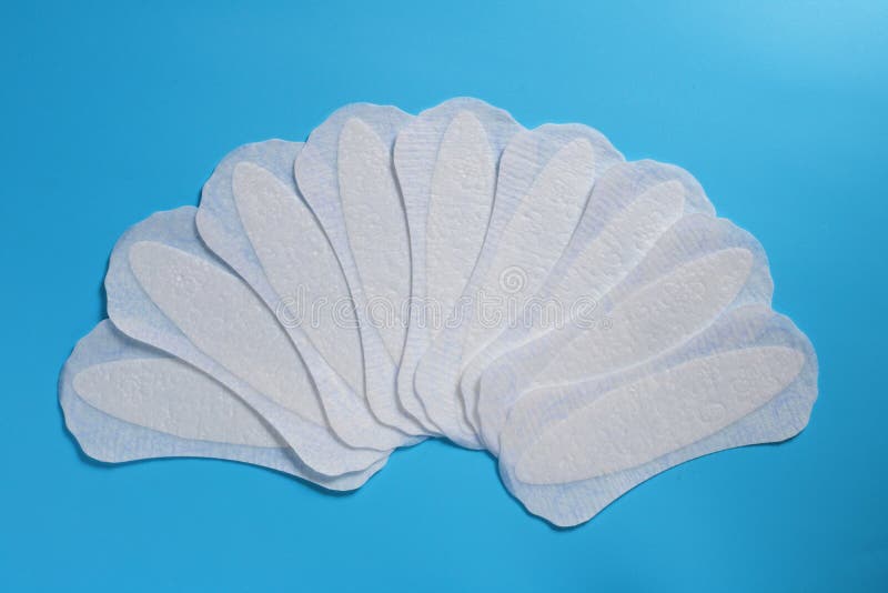 Productos de la higiene de las mujeres, cojines sanitarios diarios, espacio para el texto, limpieza y frescura, la salud de las m fotos de archivo Productos de la higiene de las mujeres, cojines sanitarios diarios, espacio para el texto, limpieza y frescura, la salud de las m fotos de archivo