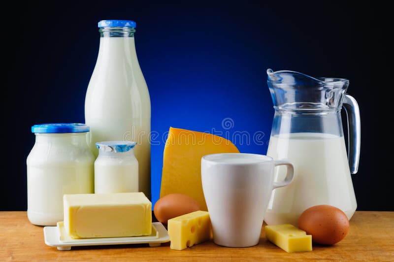 Still life with organic dairy products, milk, cheese, butter and eggs. Still life with organic dairy products, milk, cheese, butter and eggs