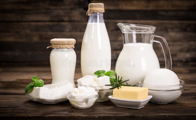 Fresh dairy products on the wooden table. Fresh dairy products on the wooden table