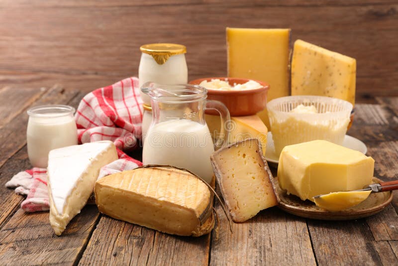 Dairy products on wood background. Dairy products on wood background