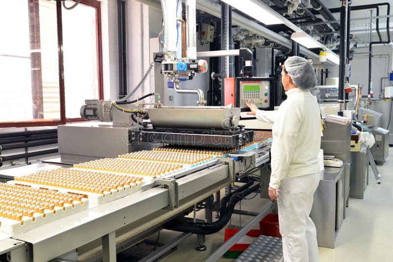Produção de confeitos em uma fábrica para a indústria alimentar - conv