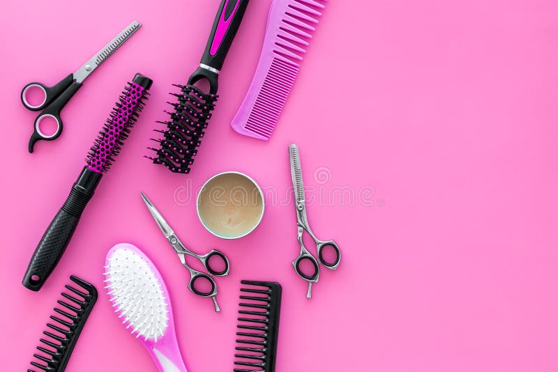 Professional accessories of hairdresser on work desk pink background top view space for text stock image Professional accessories of hairdresser on work desk pink background top view space for text stock image