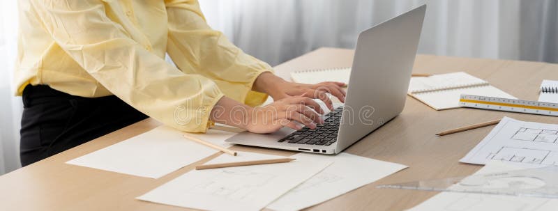 Professional architect working on laptop at office. Closeup. Delineation. royalty free stock images